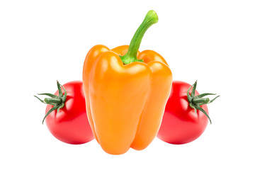 Fresh bright orange peppers and red tomato on a white background.