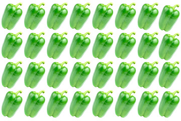 Fresh bright green peppers on a white background.