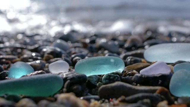 Glass pebbles on beach