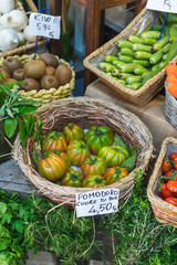 Close-up of baskets with vegetables and fruits in Italy - English translation 
