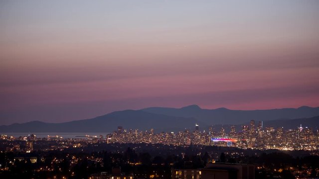 City, Ocean And Mountains Timelapse Sunset To Evening With Fireworks Far Away Zoom Shot