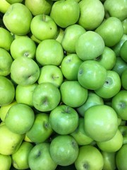 green apples on black background