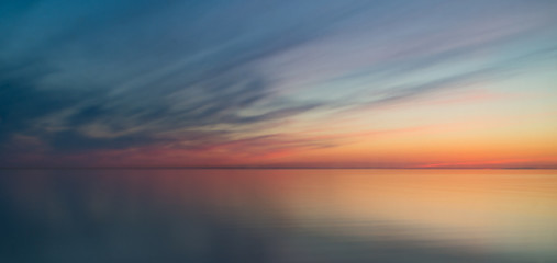 Long-exposure sunrise on the sea