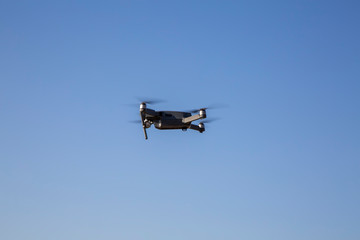 Fototapeta na wymiar Drone shooting video in the field