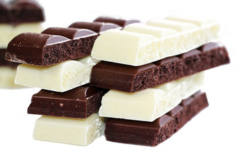Chocolate is white and black. Porous chocolate. Dessert. Cocoa.