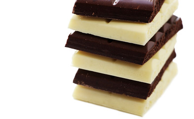 Chocolate is white and black. Porous chocolate. Dessert. Cocoa.