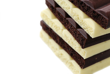 Chocolate is white and black. Porous chocolate. Dessert. Cocoa.