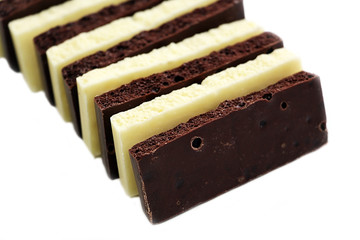 Chocolate is white and black. Porous chocolate. Dessert. Cocoa.