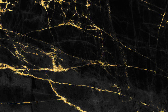 Black and gold marble texture design for cover book or brochure, poster, wallpaper background or realistic business and design artwork. © Ton Kung