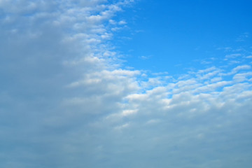 High clouds on the blue sky. Background and texture