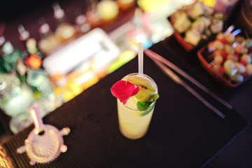 Picture of refreshing cocktail on bar.