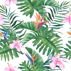 Tropical watercolor seamless pattern with exotic hibiscus and strelitzia flowers and leaves on a white background.