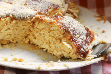 Sweet cake on a plate. A slice of cake close up