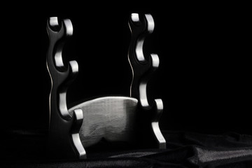 stand for three traditional Japanese swords of katana and wakazashi 刀 掛 け on a black...