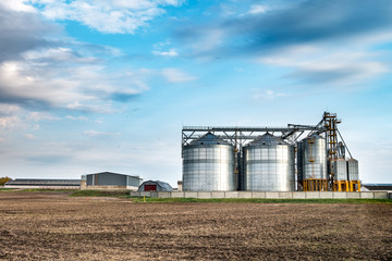 agro-processing and manufacturing plant for processing and silver silos for drying cleaning and storage of agricultural products, flour, cereals and grain. Granary elevator