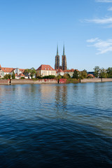 Naklejka premium Wroclaw, Poland, Cathedral of St. John the Baptist, view from the other side of the river