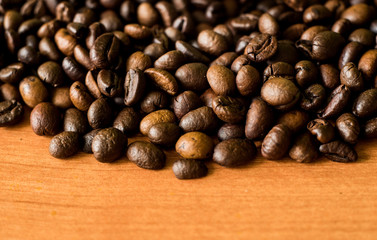 coffee beans on wooden background
