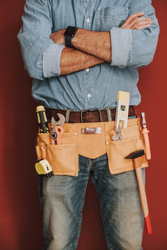 Close Up Of Man Is Wearing Tool Belt