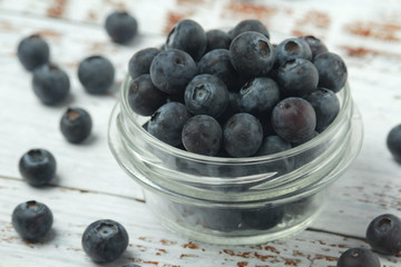 A glass bowl with blueberry	