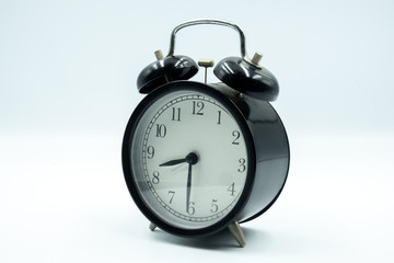 Naklejka premium The Old Classic Alarm Clock Isolated on White Background