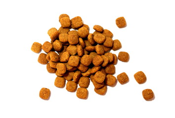 Cat food. Brown dry food. Square pieces.