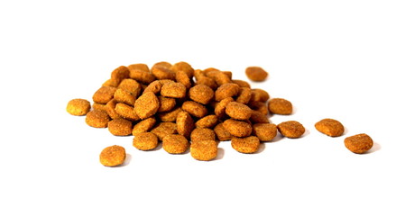 Cat food. Brown dry food. Square pieces.