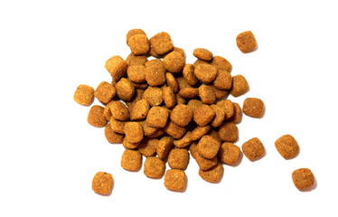 Cat food. Brown dry food. Square pieces.