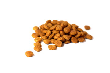 Cat food. Brown dry food. Square pieces.