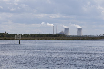 Power plant cooling towers viewed over Florida wetlands
