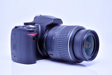 Fototapeta premium Digital camera with lens
