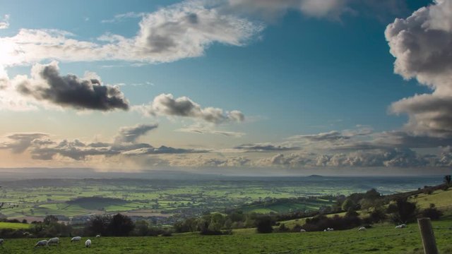 Time lapse of clouds over beautiful British countryside landscape, Somerset