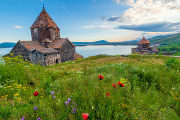 Ancient Christian monastery of Sevanavank and Lake Sevan at sunset, Armenia