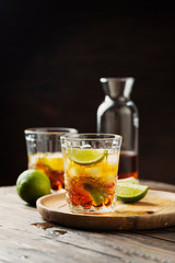 Strong golden rum with lime and ice