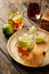 Strong golden rum with lime and ice