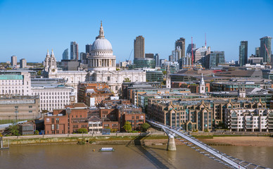 Fototapeta na wymiar St. Paul's cathedral and City of London view including river Thames and Millennium bridge in early morning.