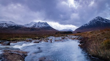 buchaille etive mor and the pass of glencoe in the argyll region of the highlands of scotland during an autumn wintry storm
