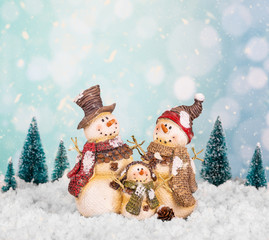 Wintery Scene With Snowmen Family