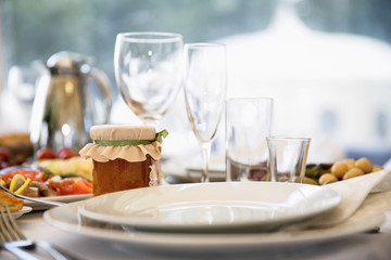 catering at a top event, glasses and flowers on the table, preparation for a significant event, beautiful dishes and glasses on the table, New Year's holiday table