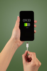 Elegant hand charging smartphone with low battery
