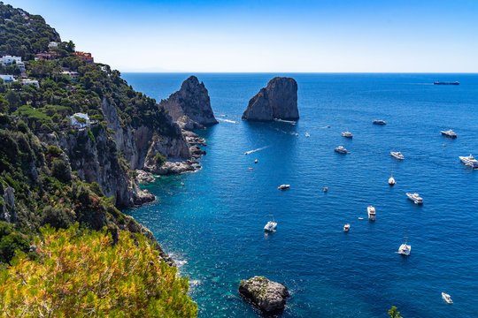 Scenic seascape from Gardens of Augustus viewpoint with Faraglioni, the most most iconic sight of Capri, Italy