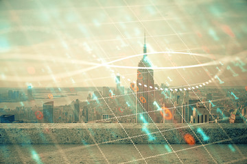 Forex graph on city view with skyscrapers background multi exposure. Financial analysis concept.