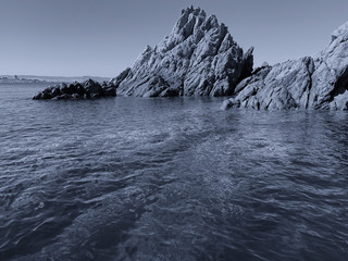 Rocky coast and crystal clear sea, Sardinia, view from boat