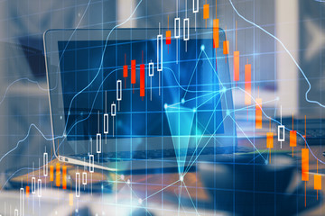 Stock market chart hologram drawn on personal computer background. Double exposure. Concept of investment.