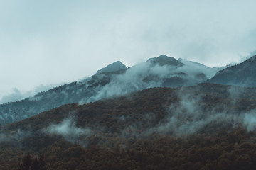 Dark smoky mountains in Krasnaya Polyana, Russia