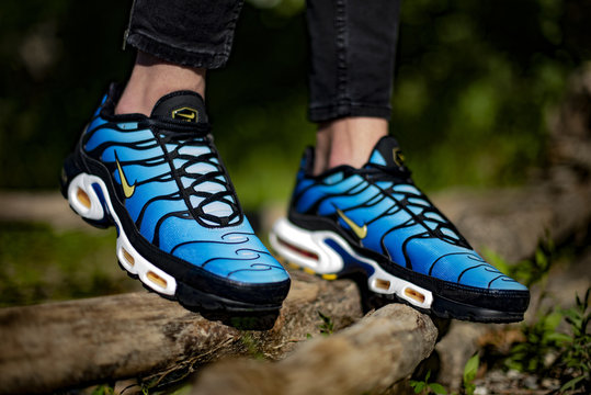Young man wearing Nike Air Max TN Hyperblue shoes outside Stock Photo |  Adobe Stock