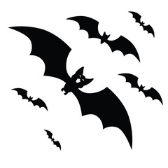 Fototapeta premium Silhouettes of flying bats traditional Halloween symbols on white background.