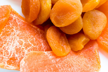 Dried apricots and slices of dried mango closeup.	