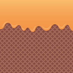 Chocolate wafer background with flowing orange sauce.