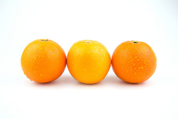 Fresh orange fruit with white background.