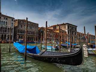 Fototapeta na wymiar Venice City shape with traditional gondola in front